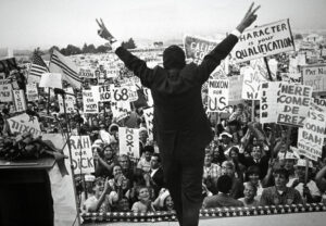 Richard Nixon gives his trademark victory salute at a California rally just prior to the 1968 presidential election.
