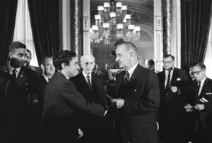 • 0918_goodwin-pen Richard Goodwin receives the pen that signed the Voting Rights Act from President Lyndon Johnson on Aug. 6, 1965. Official White House photo, courtesy of the LBJ Presidential Library.