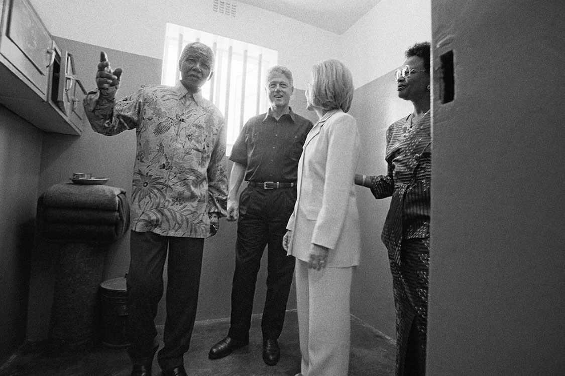 President Nelson Mandela and future wife Graca Machel, President Bill Clinton and First Lady Hillary Clinton