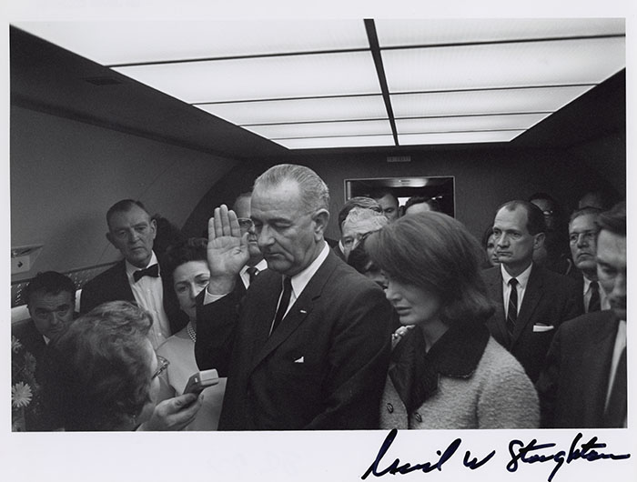 Lyndon Johnson taking the oath of office on Air Force One, Nov. 22, 1963