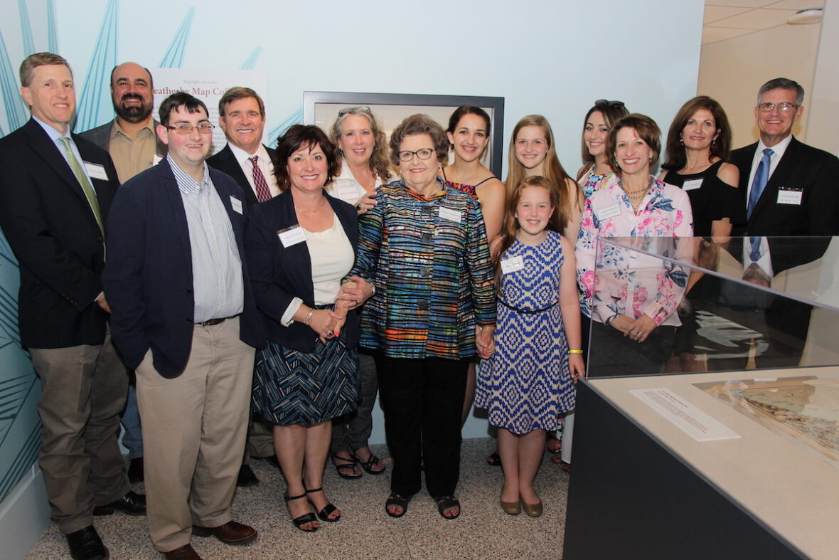 Carolyn Weatherby (center) and her family attend the naming of the Weatherby Gallery at the Briscoe Center, 2017
