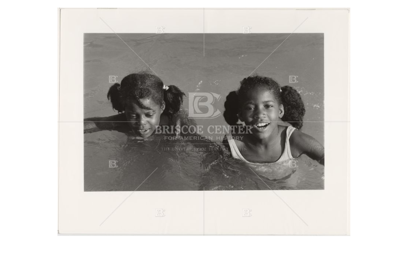 Photograph of two girls swimming at Barton Springs
