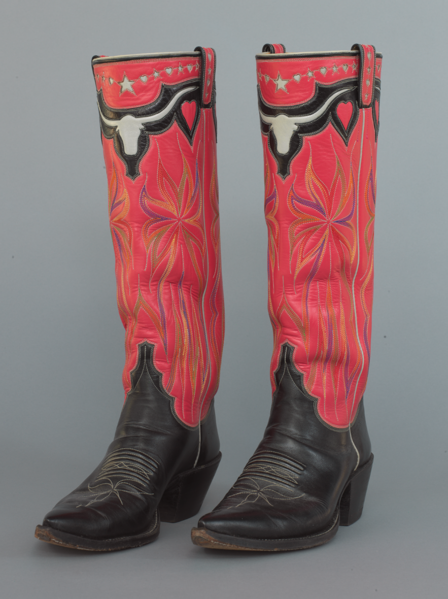 Black leather boot with raspberry coloration and longhorn motif.