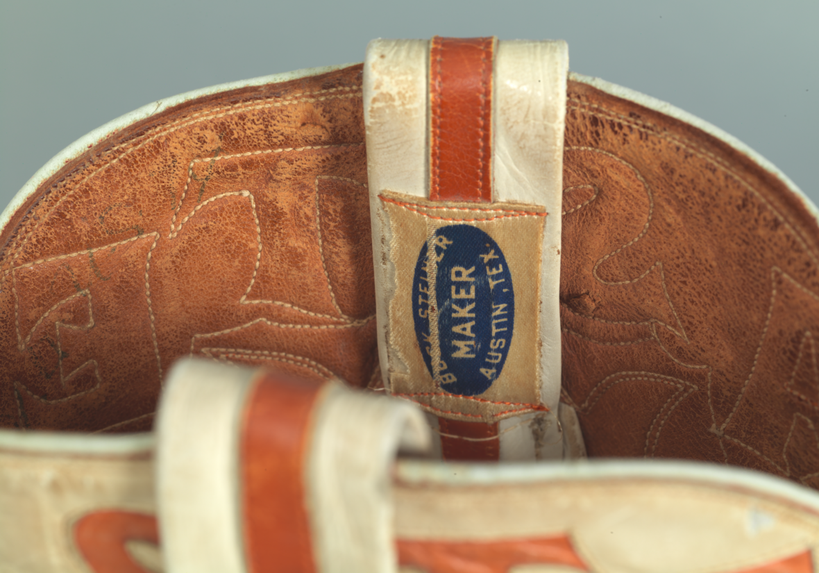 Inner stitching and logo of Charlie Dunn's boots.